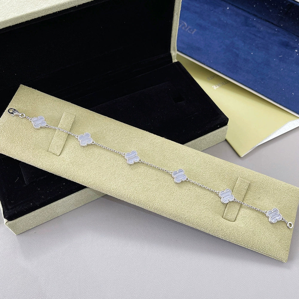 Silver-tone clover bracelet with light-blue agate flower and four-leaf links