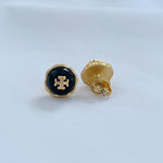 Metal stud earrings showing dark blue front with gold back posts