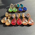 Teardrop-cut diamond stud earrings assortment: green, blue, red, and pink stones, gold-tone