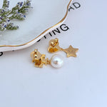 Gold rhinestone heart-and-star earrings with white pearl drops and stud-back details