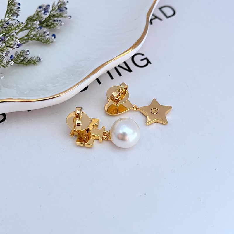 Gold rhinestone heart-and-star earrings with white pearl drops and stud-back details