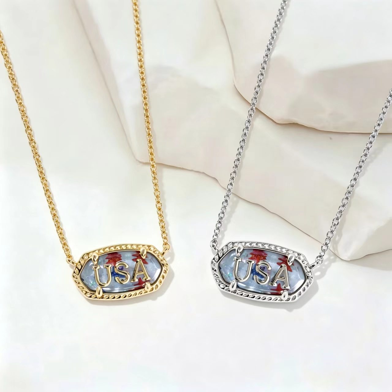 Oval USA letter pendant necklace, gold and silver-tone with blue enamel border