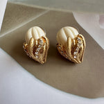 White enamel ice-cream stud earrings with gold-tone scalloped hearts and rhinestone accents