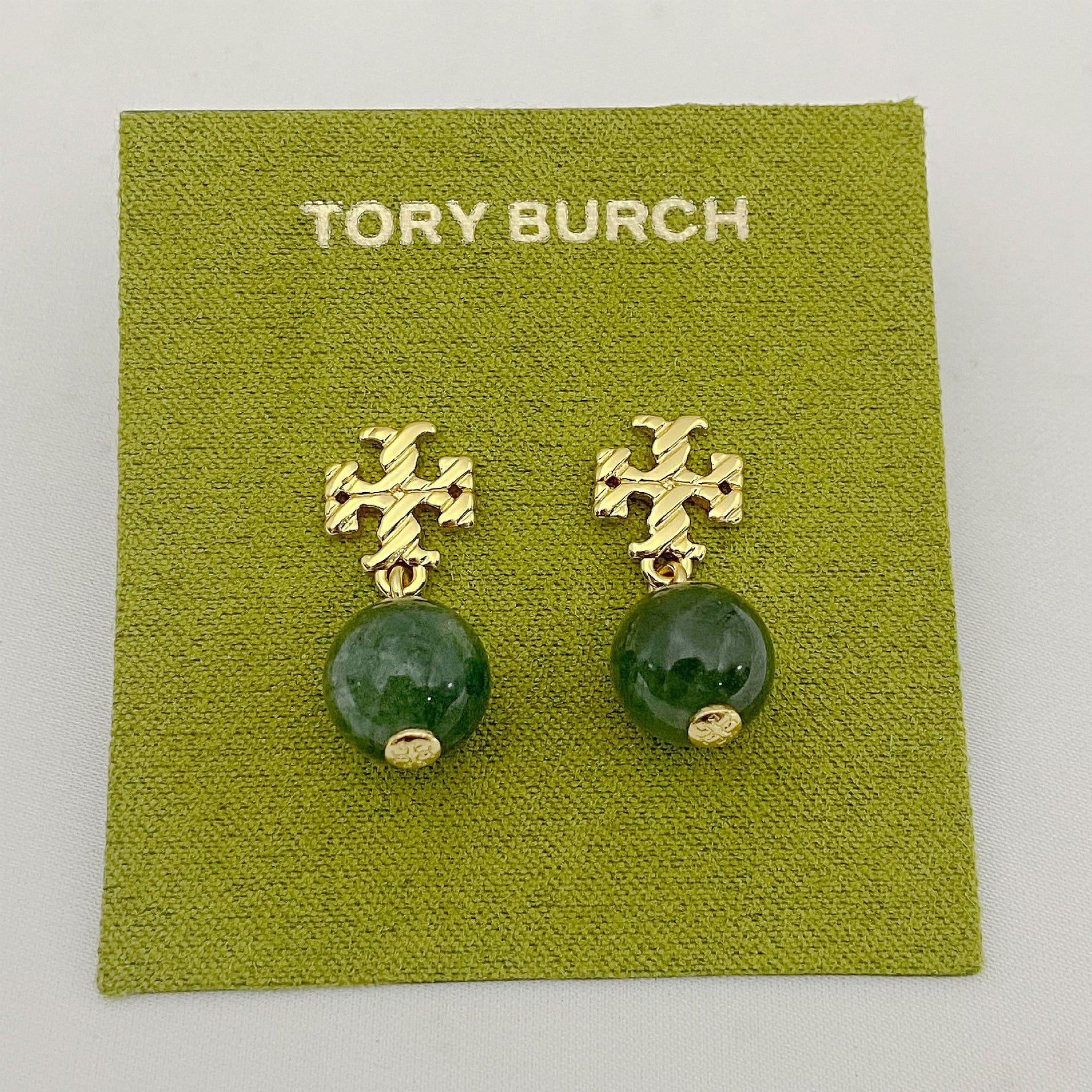 Dark green round agate pendant earrings with gold-tone geometric drop details