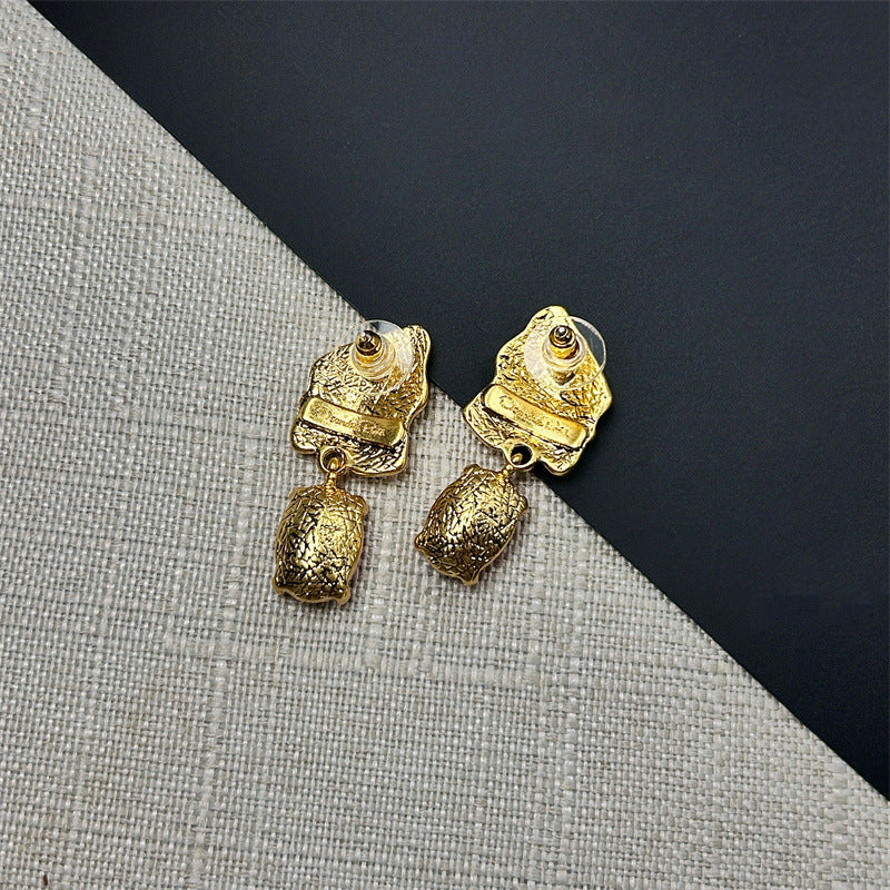 Gold-tone earring backs with hoop posts