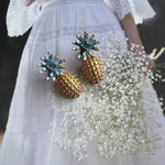 Blue enamel flower diamond earrings with gold textured pineapple drops and teal center stones
