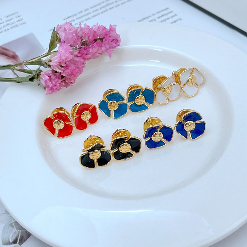 Enamel Camellia stud earrings set: red, blue, and white flowers on plate