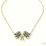 Gold checkered flag bow pendant necklace on a gold chain