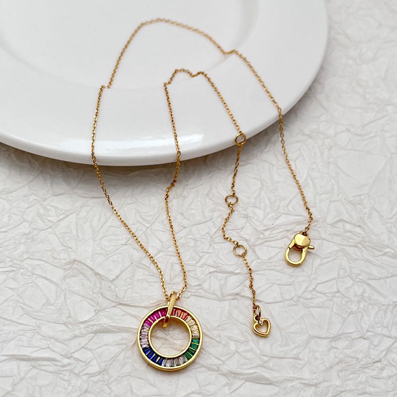 Gold-tone necklace chain with multicolor zircon donut pendant and matching hoop charm