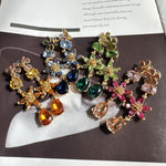Multicolor crystal floral drop earrings with gold-tone links and teardrop charms