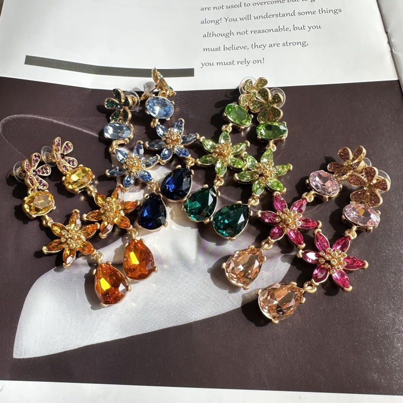 Multicolor crystal floral drop earrings with gold-tone links and teardrop charms