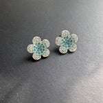 Diamond colorful floral stud earrings in silver with teal stones and clear accents