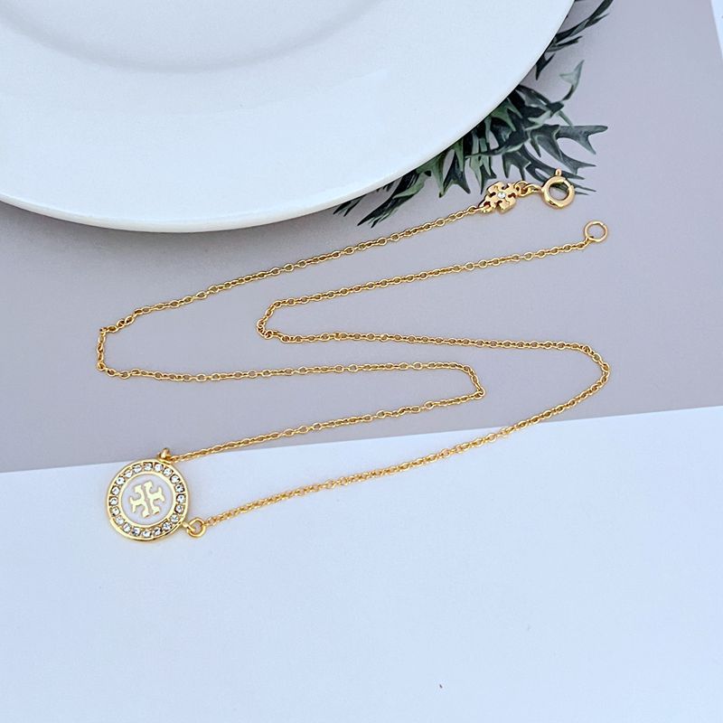Gold-tone pendant necklace with round logo enamel medallion on long chain