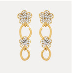 Diamond floral drop earrings in gold with white crystal petals