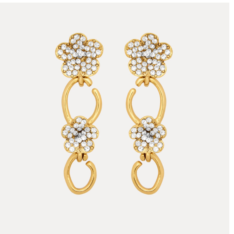 Diamond floral drop earrings in gold with white crystal petals
