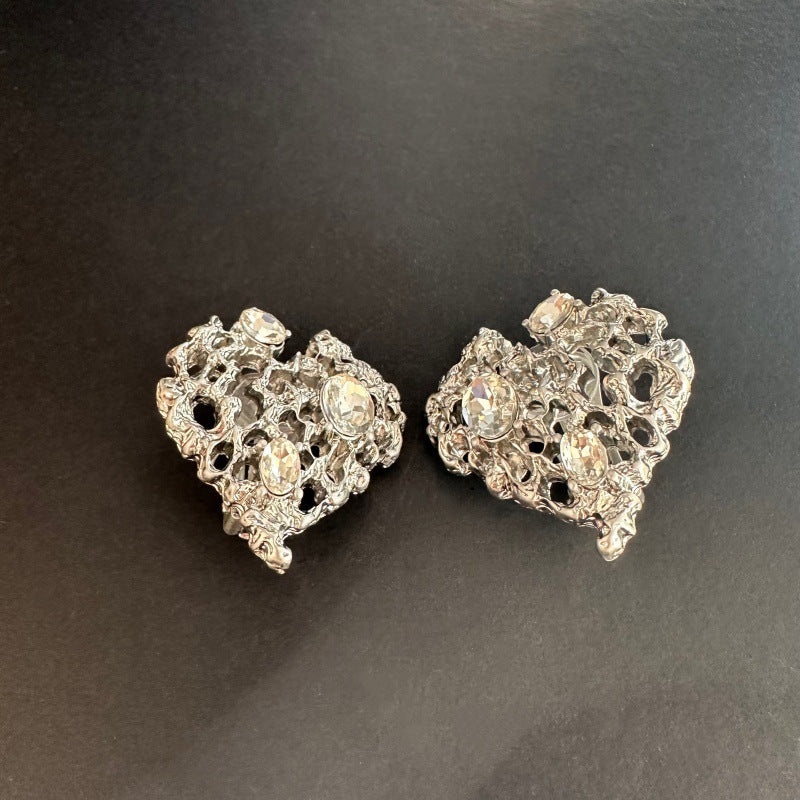 White gold-tone openwork heart stud earrings with clear round crystal details