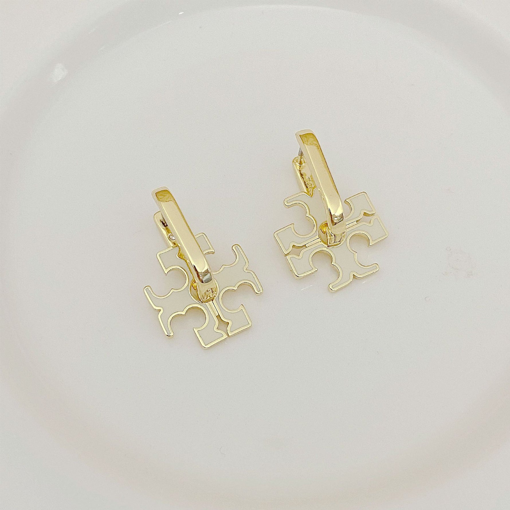 Tory Burch gold-tone logo U-shaped metal earrings with interlocking cutout motif