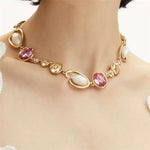 Women’s O-ring glass pearl necklace, rose pink and white oval pearls on gold chain