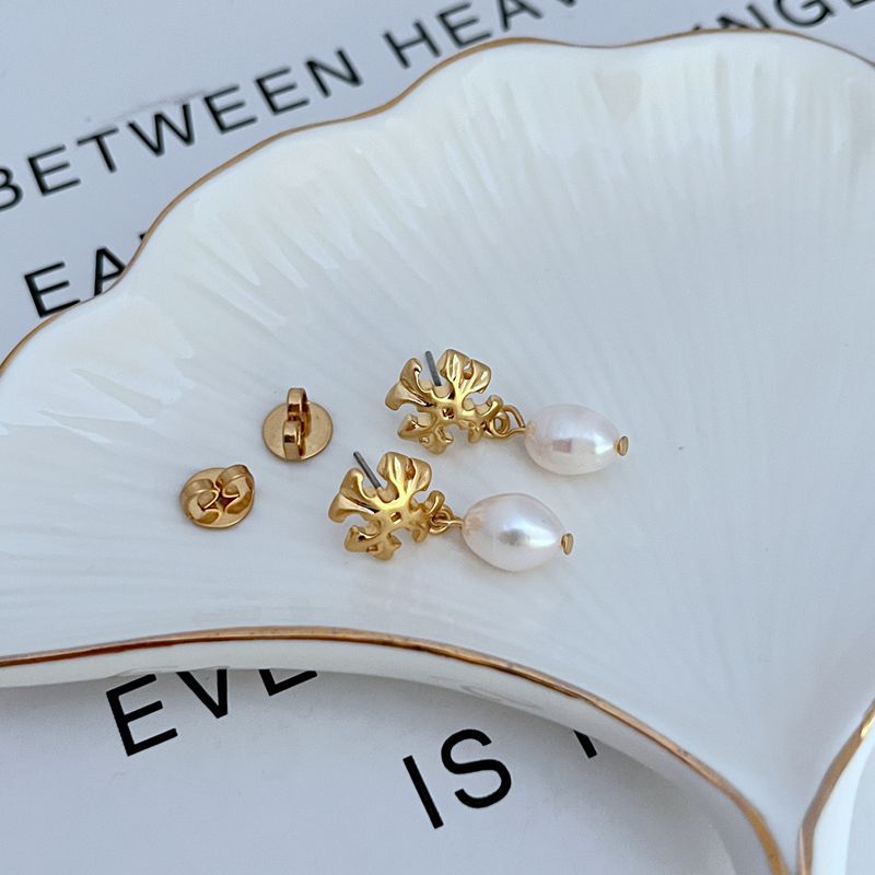 Gold-tone stud backs and logo pendant earrings with white freshwater pearls