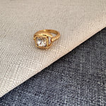 Vintage square ring with clear/white stone and textured gold setting