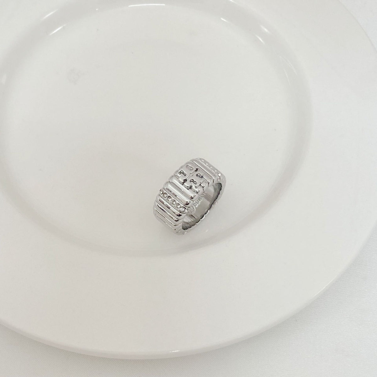 Silver-tone rhinestone letter inlay ring, engraved front panel with stone accents