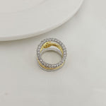 Two-tone three-band ring with silver pavé halo and gold inner band