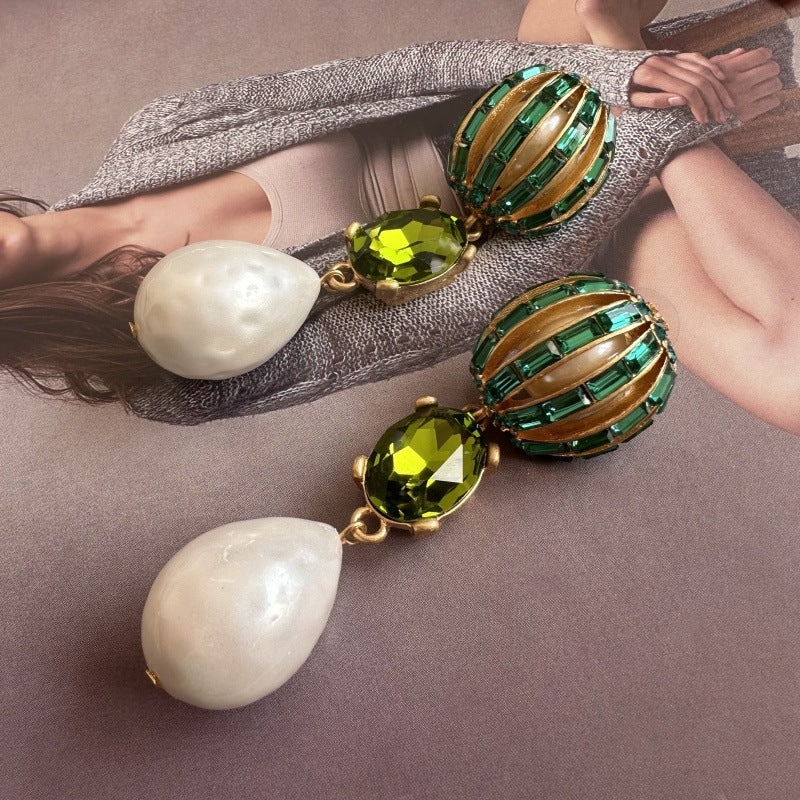Pearl drop crystal earrings with green oval stones and gold-tone hoop settings