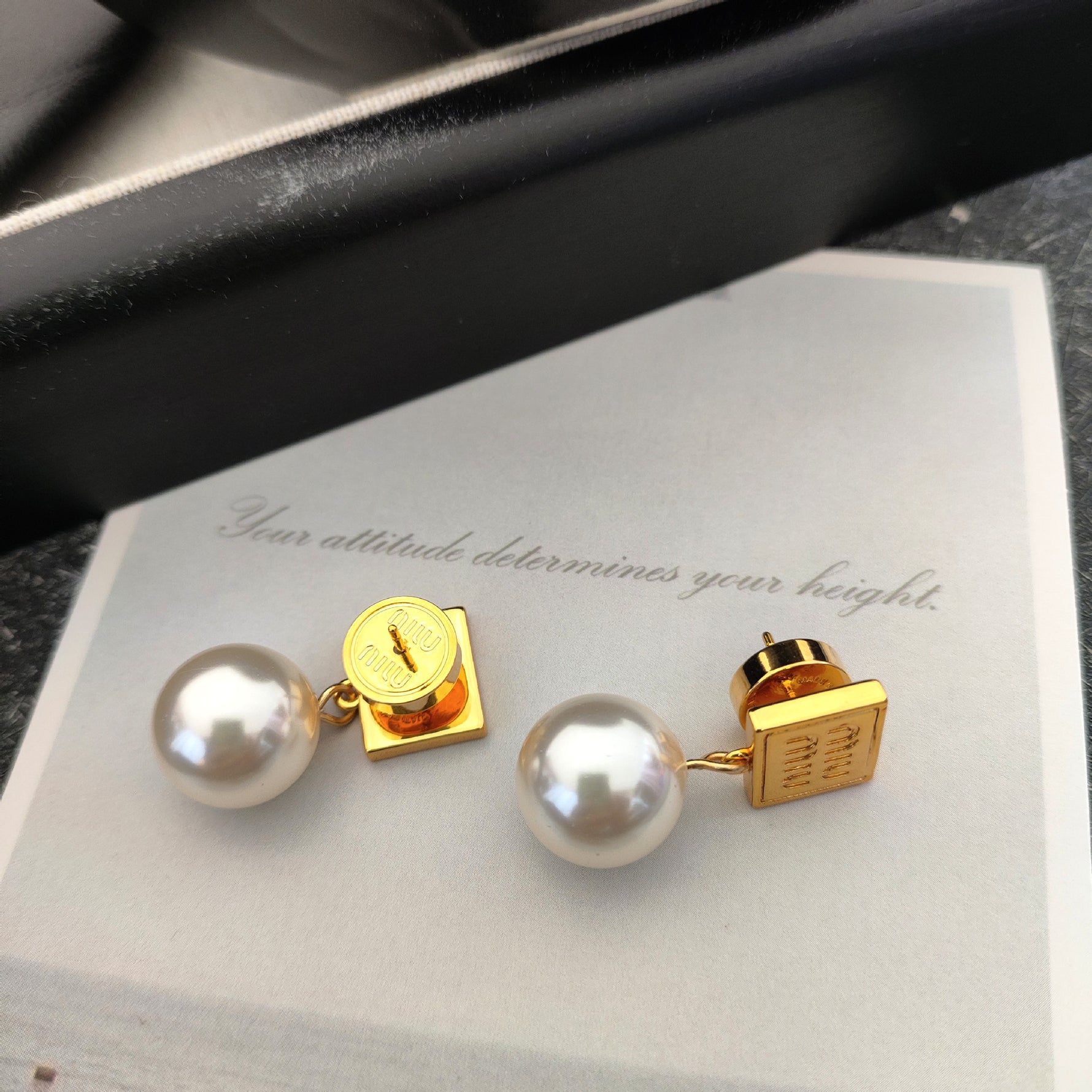 Gold square tag pearl earrings with white round pearl drops