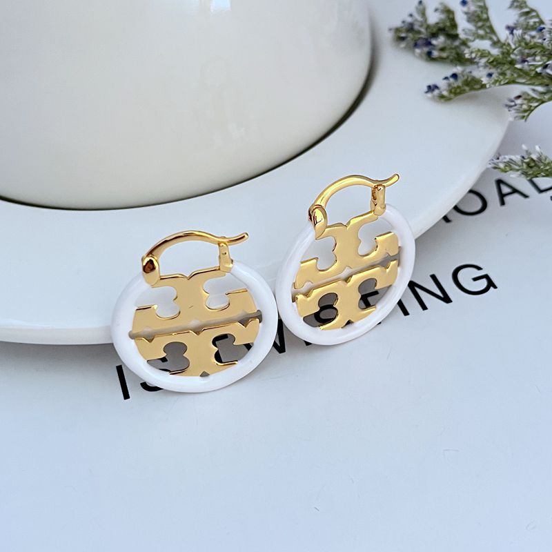 White enamel circular logo hoop earrings with gold-tone openwork metal inlay