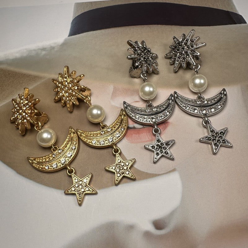 Gold and silver star-moon pendant earrings set: sunburst tops, pearls, crescent moons