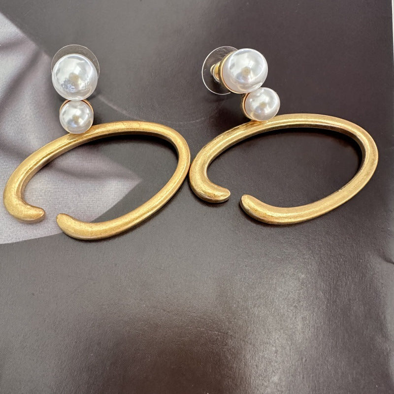 Vintage O-ring pearl earrings, gold-tone hoops with two white pearls