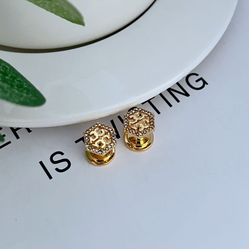 Hexagonal metal stud earrings with openwork diamond pattern, gold color