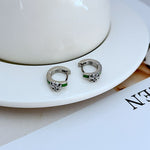 Geometric enamel hoop earrings, silver-tone with green enamel accent