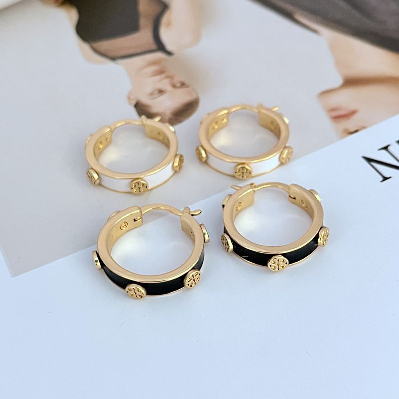 Tory Burch enamel logo hoop earrings, gold-tone with black enamel accents and small studs