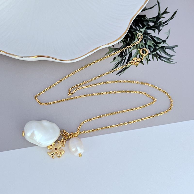 Tory Burch logo pendant necklace, gold-tone chain with white baroque pearls