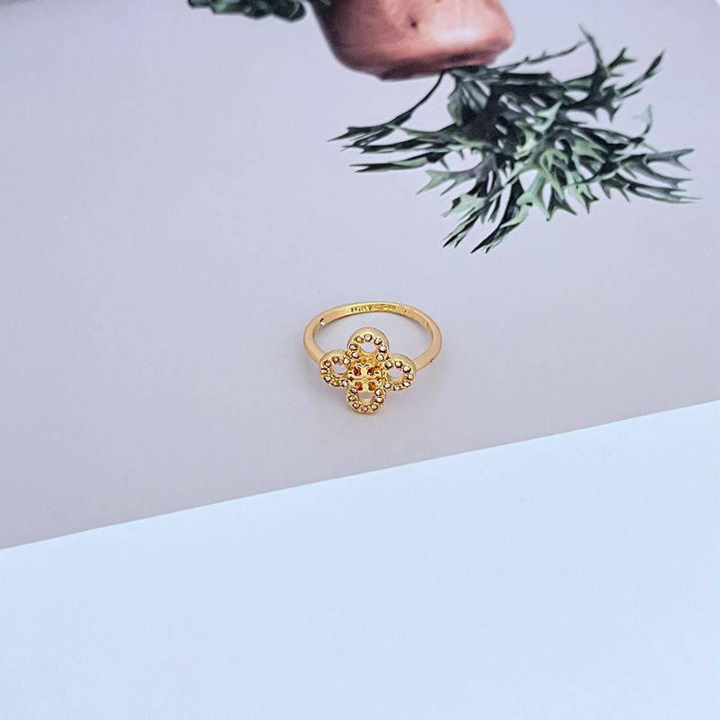 Gold diamond-set four-leaf clover flower ring, openwork metal band
