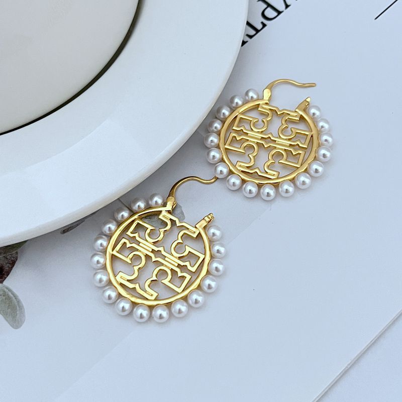 Gold round logo metal earrings with pearl border and drop hook closure