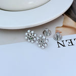 White gold-tone pearl openwork metal studs with clustered pearls and post backs