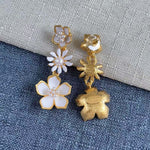 Enamel plum blossom drop earrings, white and gold blossoms with pearl accents