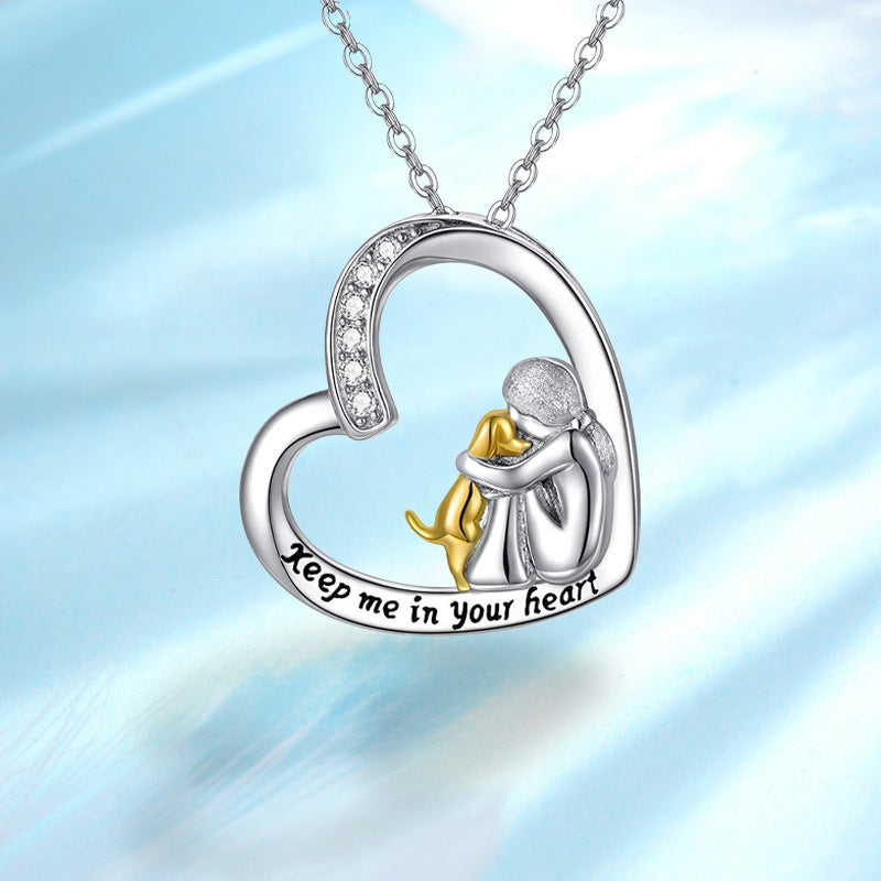 Heart pendant necklace in white-gold tone with mother-and-child figures, 'Keep me in your heart'