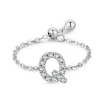 Adjustable sterling silver bracelet with pavé Q-shaped initial charm and chain links