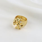 Matte gold vintage ring, side view with inner engraving and cutout logo