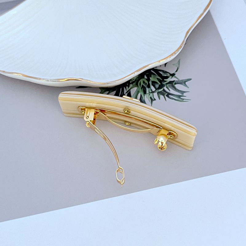Milky White acrylic hair clip, gold-tone clasp and prongs