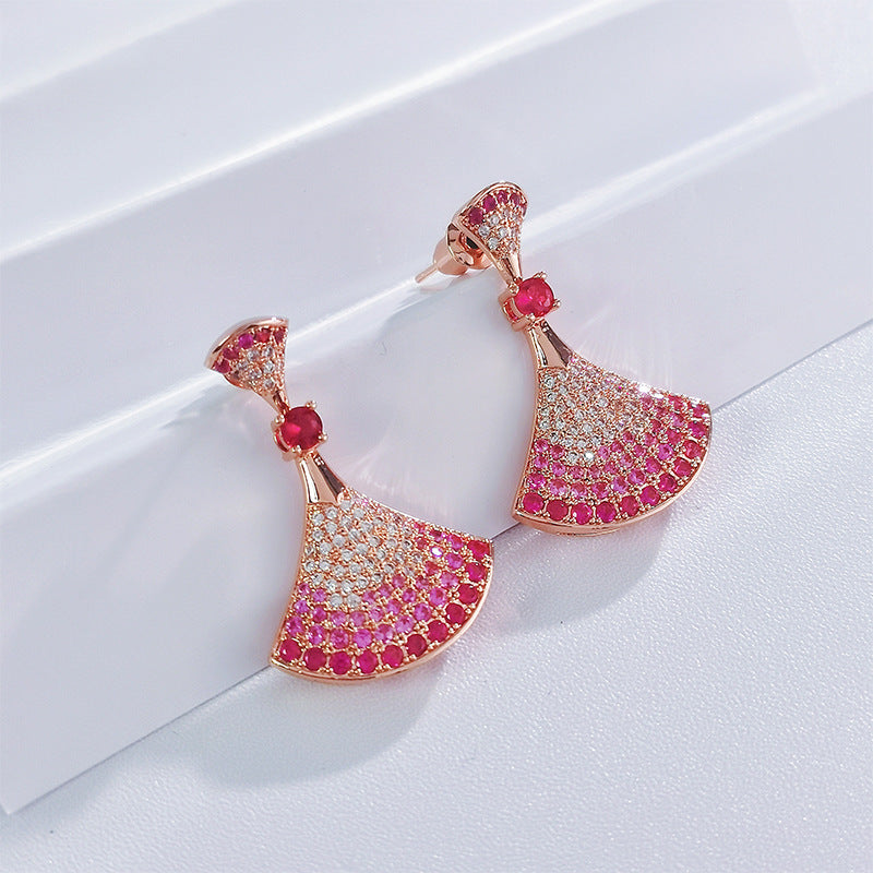 Rose gold half-fan rhinestone drop earrings with pink center stones