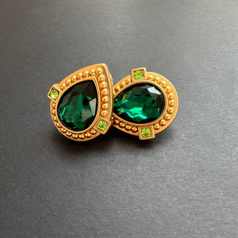 Emerald green crystal heart stud clip-on earrings in gold with green corner stones