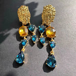 Blue and amber crystal tassel earrings with gold teardrop drop stones