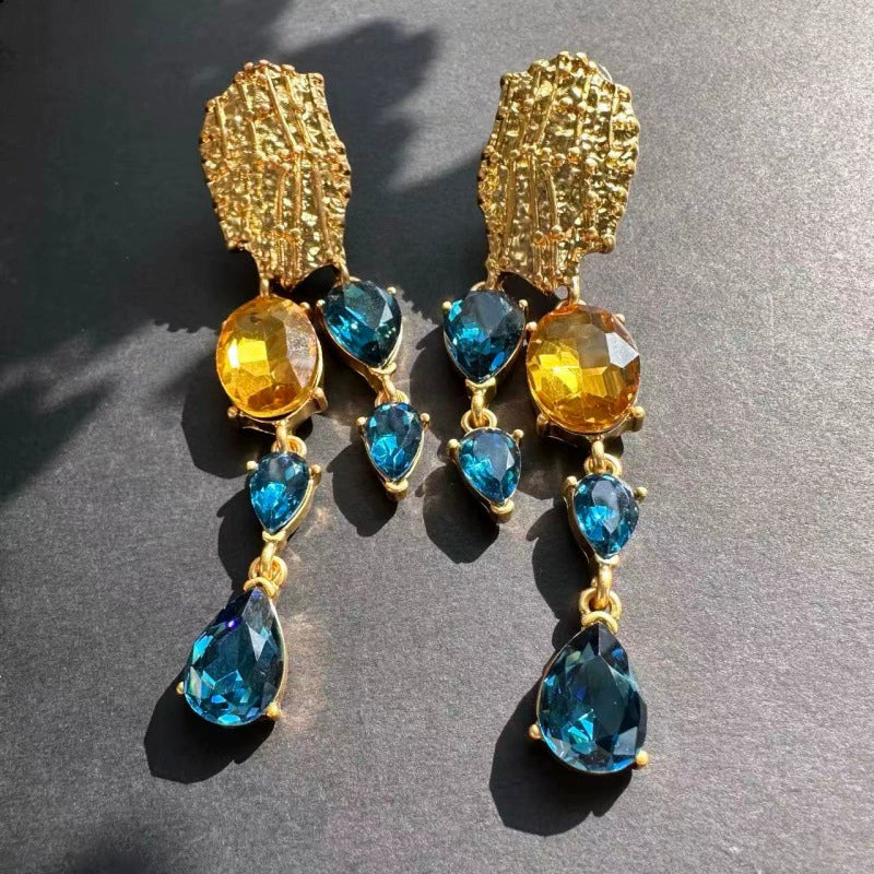 Blue and amber crystal tassel earrings with gold teardrop drop stones