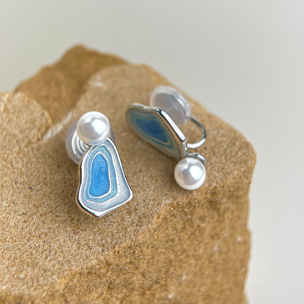 Blue enamel drop earrings with white pearls and hinged clip style backs