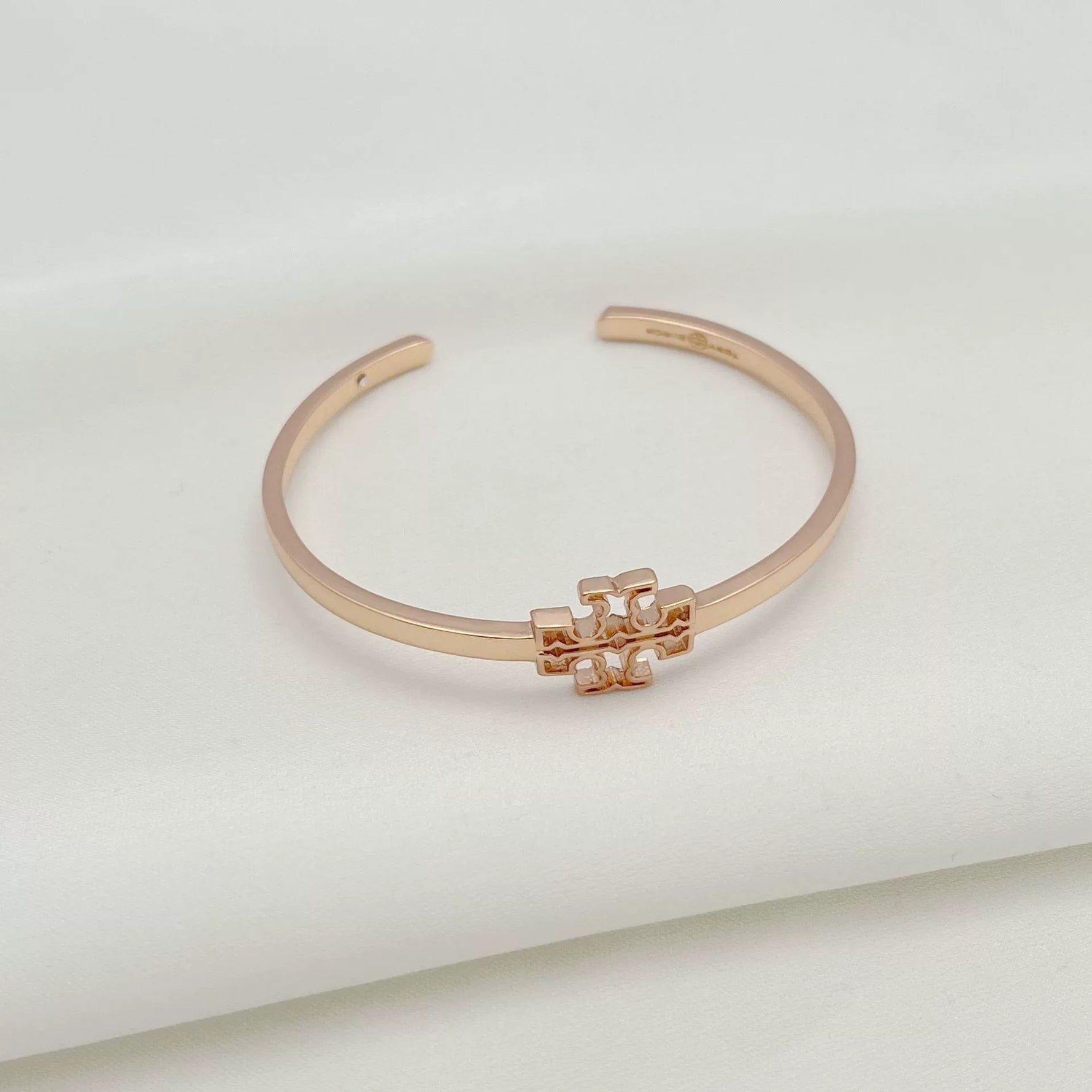 Rose gold openwork square logo smooth open metal bangle with clasp