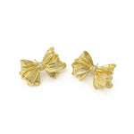 Gold-tone bow stud earrings with rhinestone accents